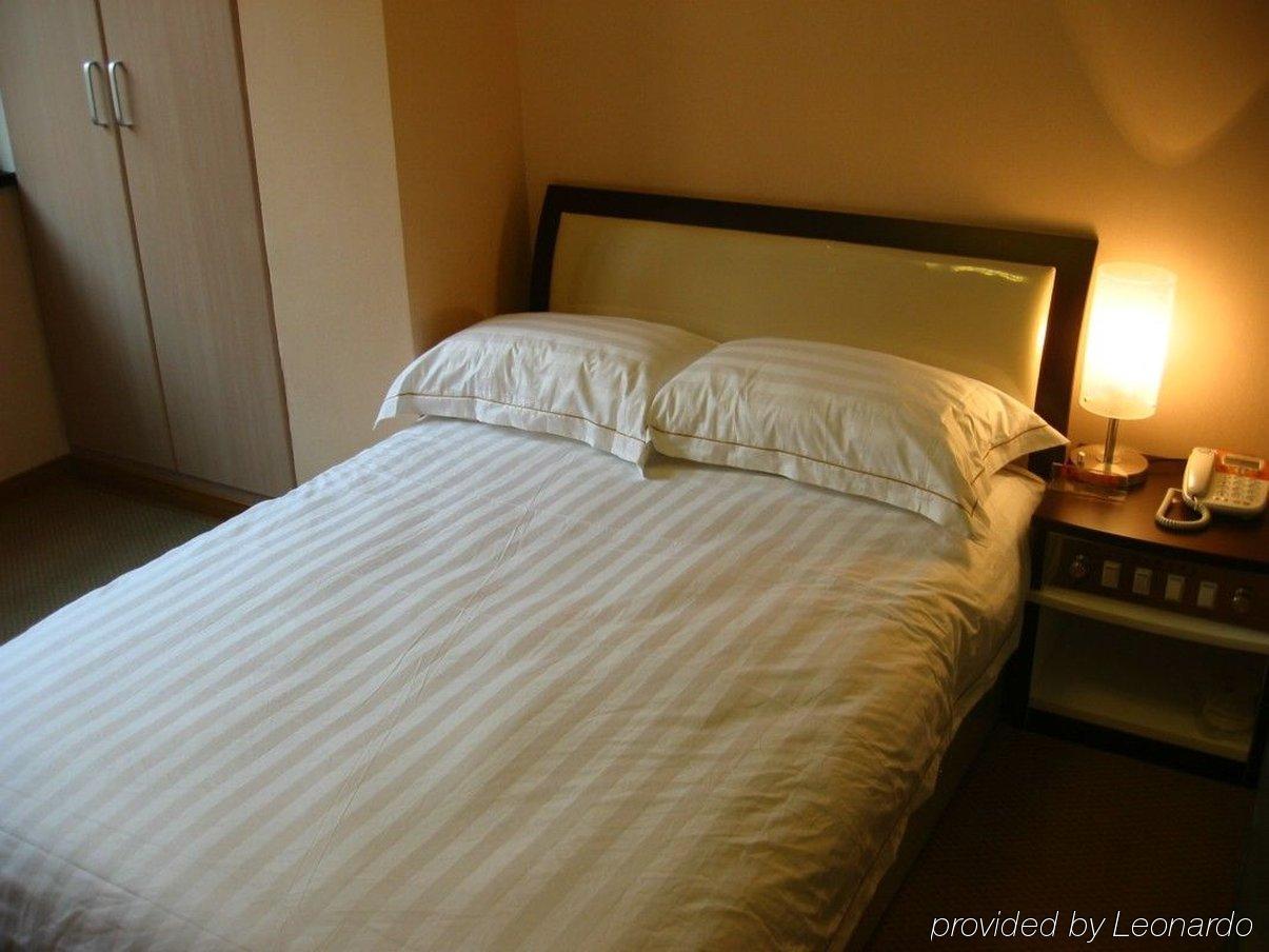 Jiujiu Holiday Hotel Shanghai Kamer foto